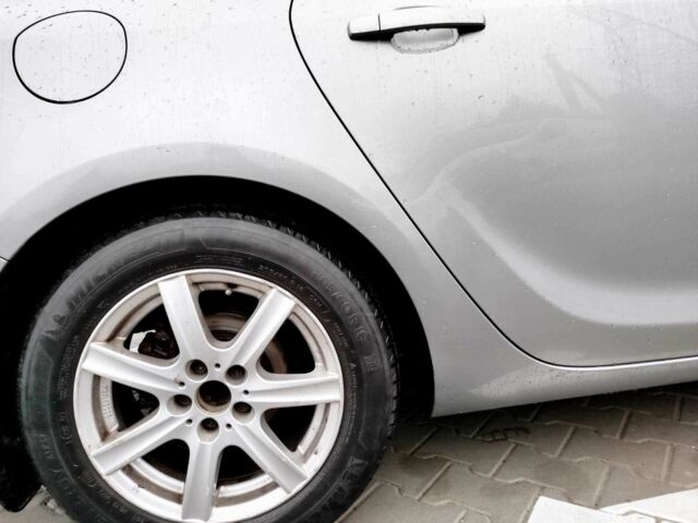 Серый Опель Астра, объемом двигателя 1.2 л и пробегом 254 тыс. км за 5000 $, фото 6 на Automoto.ua