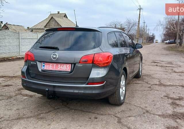 Серый Опель Астра, объемом двигателя 1.7 л и пробегом 185 тыс. км за 7500 $, фото 6 на Automoto.ua