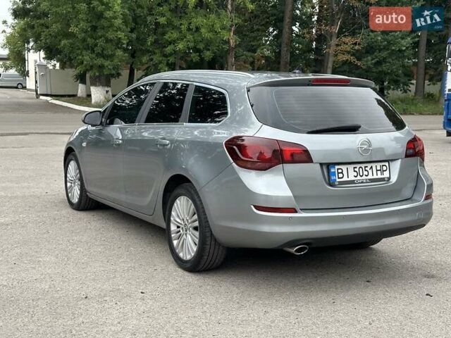 Серый Опель Астра, объемом двигателя 2 л и пробегом 240 тыс. км за 7100 $, фото 8 на Automoto.ua