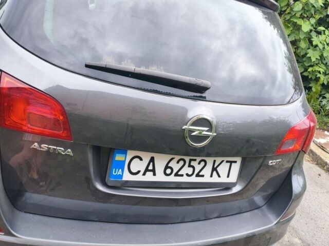 Сірий Опель Астра, об'ємом двигуна 1 л та пробігом 240 тис. км за 8048 $, фото 2 на Automoto.ua
