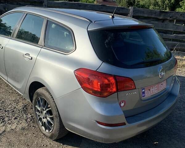 Серый Опель Астра, объемом двигателя 1.6 л и пробегом 219 тыс. км за 6450 $, фото 2 на Automoto.ua