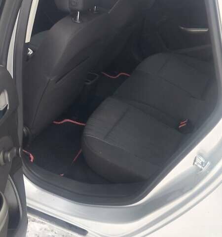 Серый Опель Астра, объемом двигателя 1.4 л и пробегом 183 тыс. км за 6400 $, фото 9 на Automoto.ua