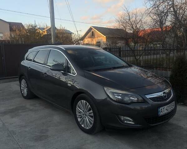 Серый Опель Астра, объемом двигателя 1.3 л и пробегом 264 тыс. км за 7300 $, фото 6 на Automoto.ua