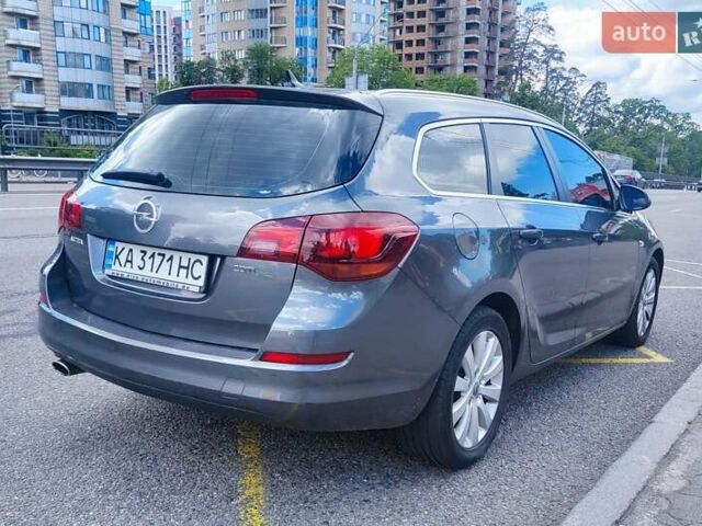 Серый Опель Астра, объемом двигателя 2 л и пробегом 244 тыс. км за 8300 $, фото 1 на Automoto.ua