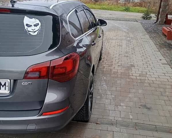 Серый Опель Астра, объемом двигателя 1.7 л и пробегом 236 тыс. км за 7200 $, фото 6 на Automoto.ua