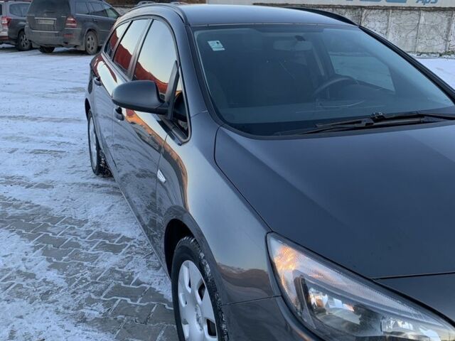 Сірий Опель Астра, об'ємом двигуна 1.2 л та пробігом 264 тис. км за 6000 $, фото 1 на Automoto.ua