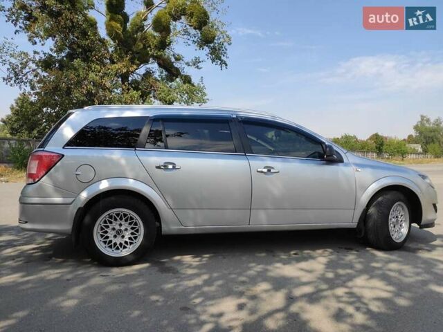 Сірий Опель Астра, об'ємом двигуна 1.69 л та пробігом 253 тис. км за 6350 $, фото 3 на Automoto.ua