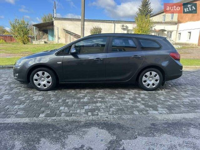 Серый Опель Астра, объемом двигателя 1.2 л и пробегом 294 тыс. км за 5900 $, фото 10 на Automoto.ua