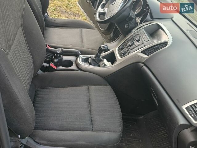 Серый Опель Астра, объемом двигателя 1.4 л и пробегом 180 тыс. км за 6500 $, фото 2 на Automoto.ua