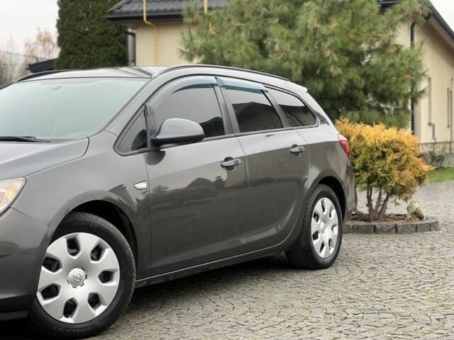 Серый Опель Астра, объемом двигателя 1.2 л и пробегом 264 тыс. км за 4750 $, фото 6 на Automoto.ua