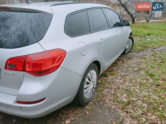 Серый Опель Астра, объемом двигателя 1.3 л и пробегом 286 тыс. км за 5200 $, фото 2 на Automoto.ua