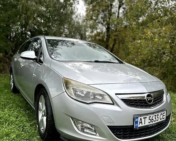 Серый Опель Астра, объемом двигателя 1.3 л и пробегом 370 тыс. км за 5900 $, фото 6 на Automoto.ua