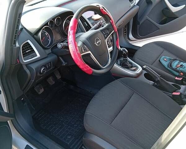 Серый Опель Астра, объемом двигателя 1.4 л и пробегом 183 тыс. км за 5700 $, фото 7 на Automoto.ua