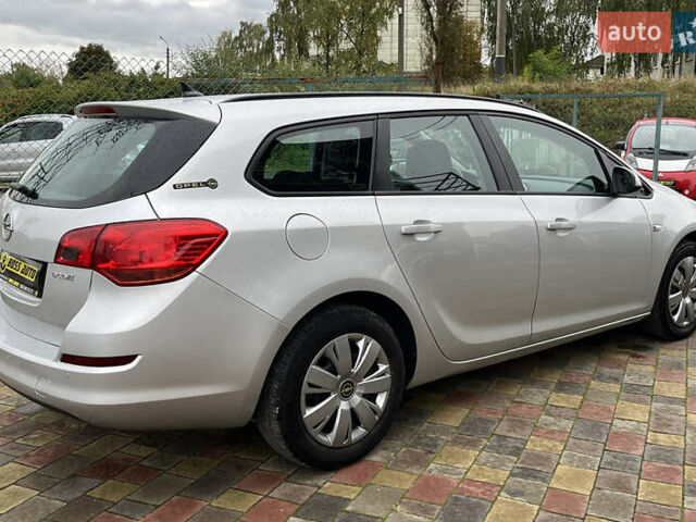 Серый Опель Астра, объемом двигателя 1.25 л и пробегом 238 тыс. км за 5499 $, фото 6 на Automoto.ua