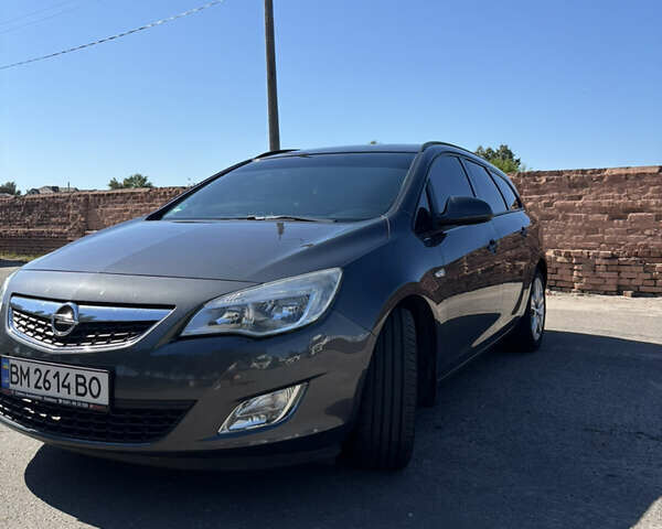 Серый Опель Астра, объемом двигателя 1.69 л и пробегом 208 тыс. км за 7500 $, фото 1 на Automoto.ua