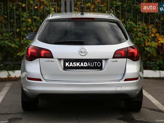 Серый Опель Астра, объемом двигателя 1.69 л и пробегом 233 тыс. км за 7800 $, фото 4 на Automoto.ua