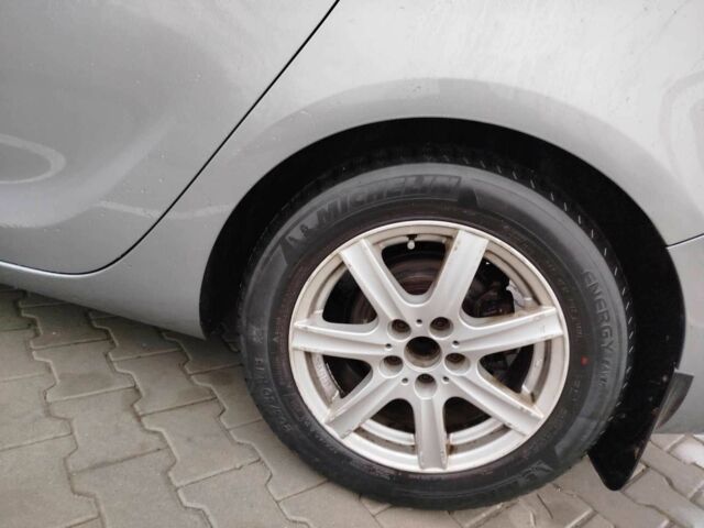 Серый Опель Астра, объемом двигателя 1.2 л и пробегом 254 тыс. км за 5000 $, фото 9 на Automoto.ua