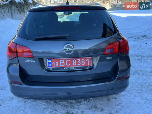Серый Опель Астра, объемом двигателя 1.7 л и пробегом 254 тыс. км за 6900 $, фото 16 на Automoto.ua