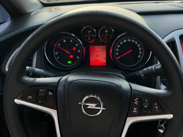 Серый Опель Астра, объемом двигателя 1.3 л и пробегом 291 тыс. км за 5600 $, фото 7 на Automoto.ua