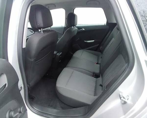 Серый Опель Астра, объемом двигателя 1.3 л и пробегом 236 тыс. км за 6950 $, фото 11 на Automoto.ua