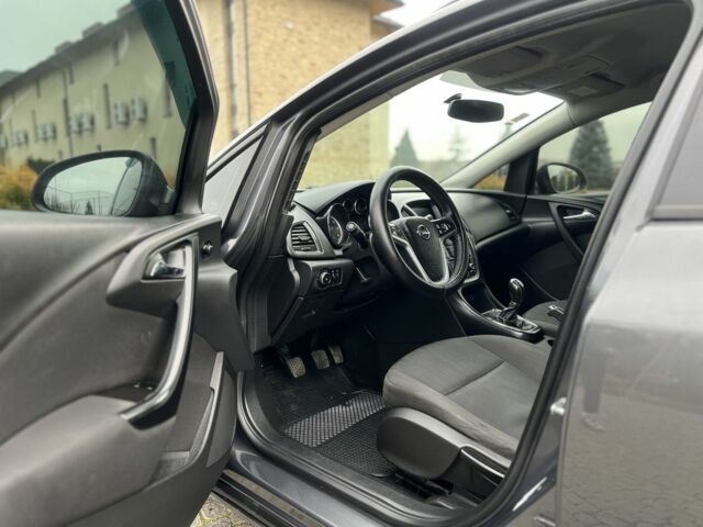 Серый Опель Астра, объемом двигателя 1.2 л и пробегом 264 тыс. км за 4750 $, фото 10 на Automoto.ua