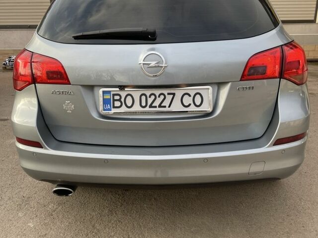 Сірий Опель Астра, об'ємом двигуна 2 л та пробігом 300 тис. км за 7300 $, фото 4 на Automoto.ua