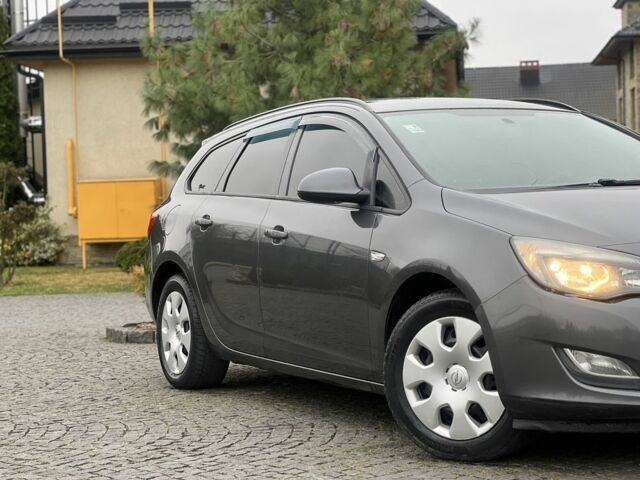 Серый Опель Астра, объемом двигателя 1.2 л и пробегом 264 тыс. км за 4750 $, фото 2 на Automoto.ua