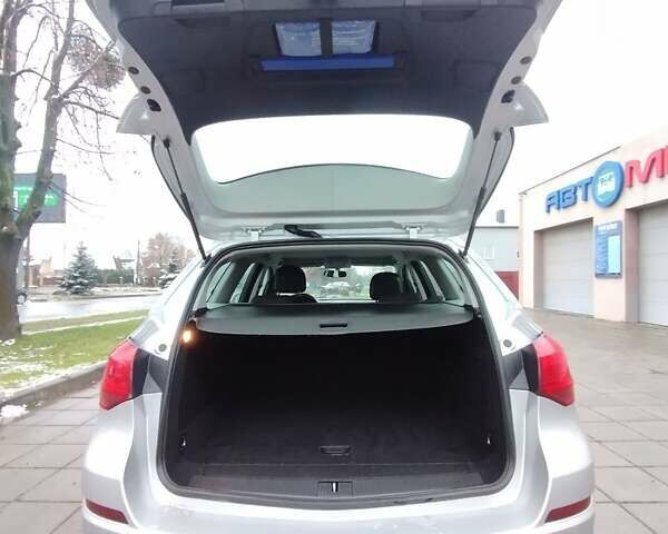 Серый Опель Астра, объемом двигателя 1.3 л и пробегом 236 тыс. км за 6950 $, фото 4 на Automoto.ua