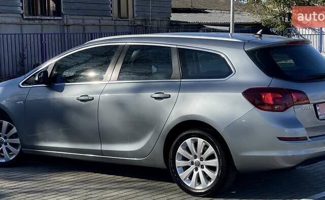 Серый Опель Астра, объемом двигателя 1.7 л и пробегом 259 тыс. км за 7700 $, фото 18 на Automoto.ua