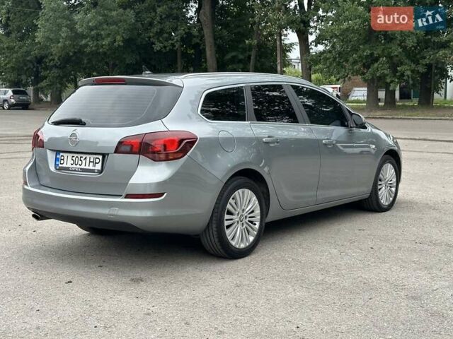 Серый Опель Астра, объемом двигателя 2 л и пробегом 240 тыс. км за 7100 $, фото 6 на Automoto.ua