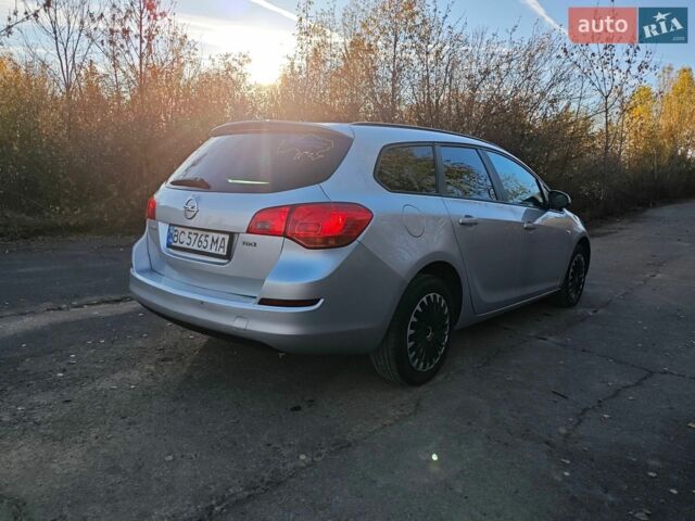 Серый Опель Астра, объемом двигателя 1.7 л и пробегом 259 тыс. км за 5550 $, фото 10 на Automoto.ua