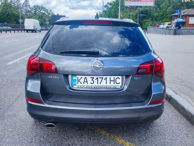 Серый Опель Астра, объемом двигателя 2 л и пробегом 244 тыс. км за 8300 $, фото 8 на Automoto.ua