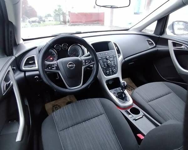 Серый Опель Астра, объемом двигателя 1.3 л и пробегом 236 тыс. км за 6950 $, фото 13 на Automoto.ua