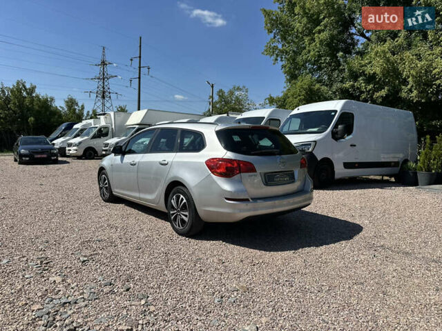 Серый Опель Астра, объемом двигателя 1.7 л и пробегом 183 тыс. км за 7700 $, фото 6 на Automoto.ua
