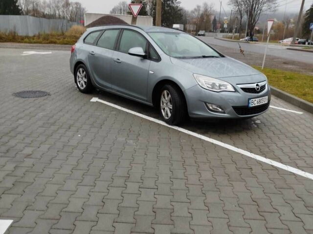 Серый Опель Астра, объемом двигателя 1.2 л и пробегом 254 тыс. км за 5000 $, фото 2 на Automoto.ua