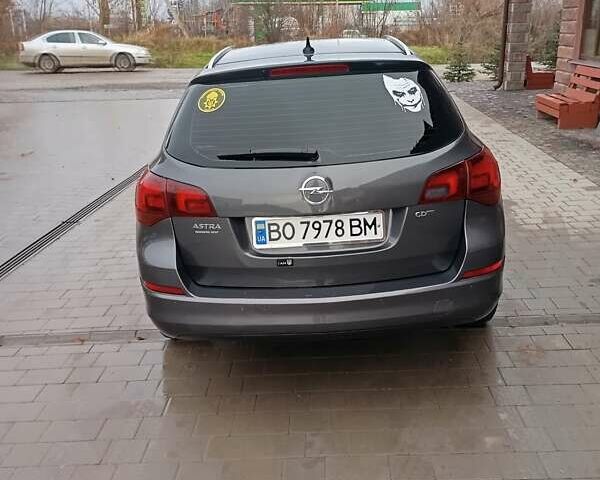 Серый Опель Астра, объемом двигателя 1.7 л и пробегом 236 тыс. км за 7200 $, фото 7 на Automoto.ua
