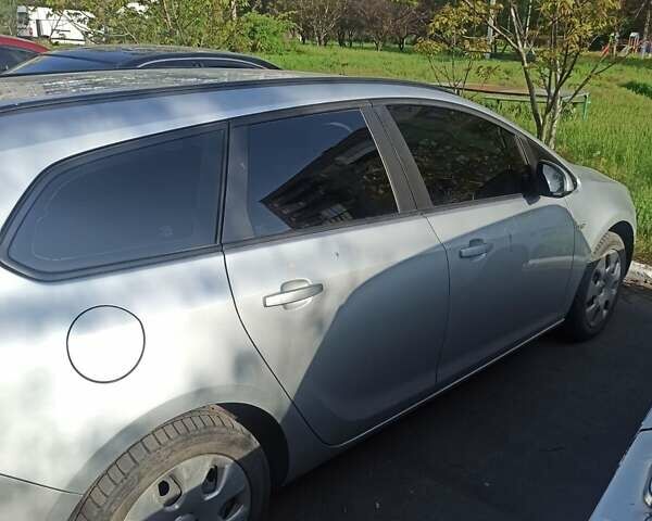 Сірий Опель Астра, об'ємом двигуна 1.3 л та пробігом 218 тис. км за 7950 $, фото 5 на Automoto.ua