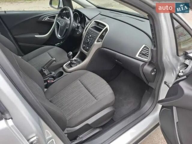Серый Опель Астра, объемом двигателя 1.3 л и пробегом 241 тыс. км за 6500 $, фото 19 на Automoto.ua