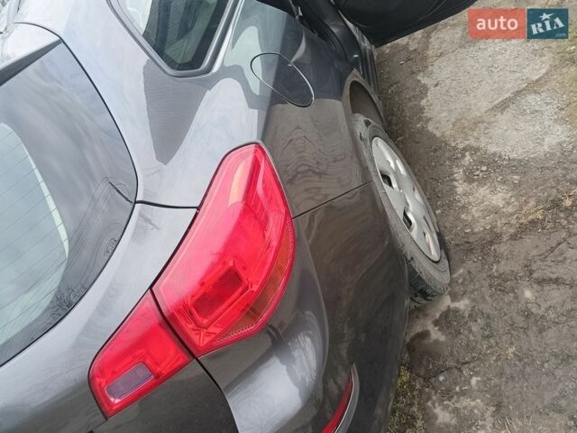 Серый Опель Астра, объемом двигателя 1.4 л и пробегом 180 тыс. км за 6500 $, фото 5 на Automoto.ua