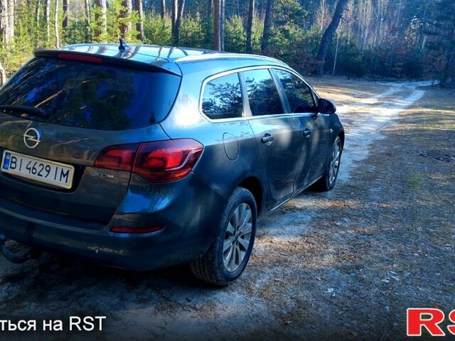 Серый Опель Астра, объемом двигателя 1.2 л и пробегом 220 тыс. км за 5200 $, фото 3 на Automoto.ua