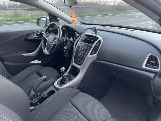 Серый Опель Астра, объемом двигателя 1.2 л и пробегом 255 тыс. км за 5700 $, фото 7 на Automoto.ua