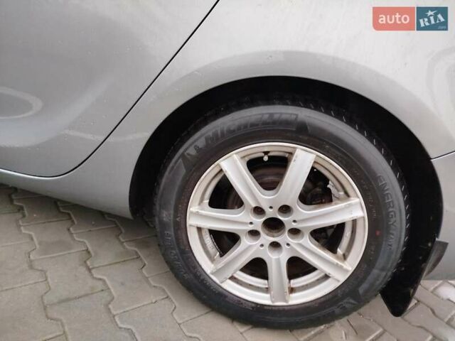 Серый Опель Астра, объемом двигателя 1.25 л и пробегом 254 тыс. км за 5000 $, фото 11 на Automoto.ua