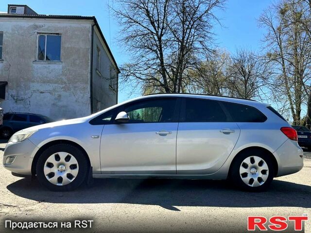 Серый Опель Астра, объемом двигателя 1.2 л и пробегом 282 тыс. км за 6050 $, фото 5 на Automoto.ua