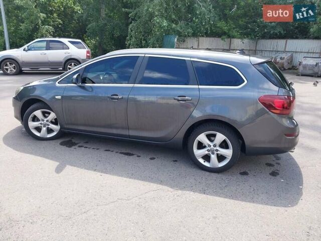 Сірий Опель Астра, об'ємом двигуна 1.4 л та пробігом 166 тис. км за 8300 $, фото 4 на Automoto.ua