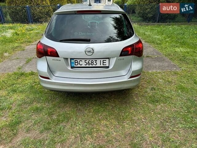 Серый Опель Астра, объемом двигателя 1.7 л и пробегом 283 тыс. км за 6300 $, фото 9 на Automoto.ua