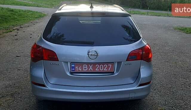 Серый Опель Астра, объемом двигателя 1.7 л и пробегом 248 тыс. км за 6950 $, фото 10 на Automoto.ua