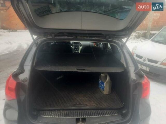 Серый Опель Астра, объемом двигателя 1.2 л и пробегом 275 тыс. км за 5000 $, фото 3 на Automoto.ua