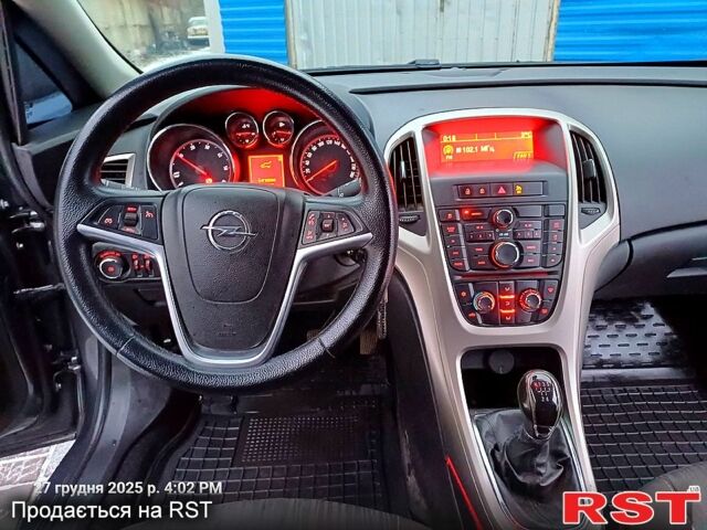 Сірий Опель Астра, об'ємом двигуна 1.2 л та пробігом 220 тис. км за 5999 $, фото 1 на Automoto.ua