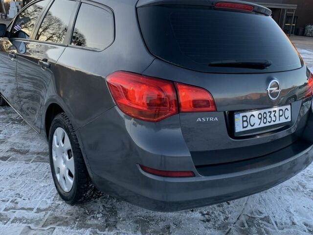 Сірий Опель Астра, об'ємом двигуна 1.2 л та пробігом 264 тис. км за 6000 $, фото 5 на Automoto.ua