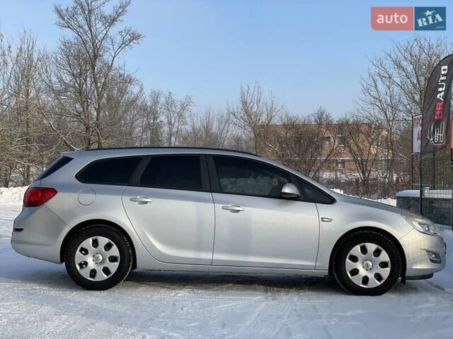 Сірий Опель Астра, об'ємом двигуна 1.3 л та пробігом 182 тис. км за 6799 $, фото 21 на Automoto.ua